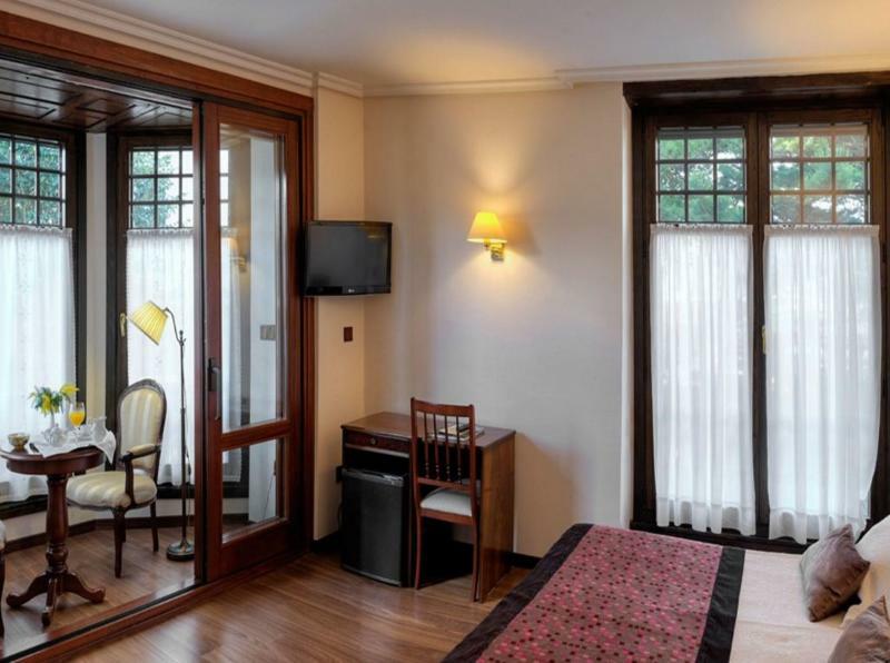 Hotel Y Apartamentos Arias Навия Экстерьер фото